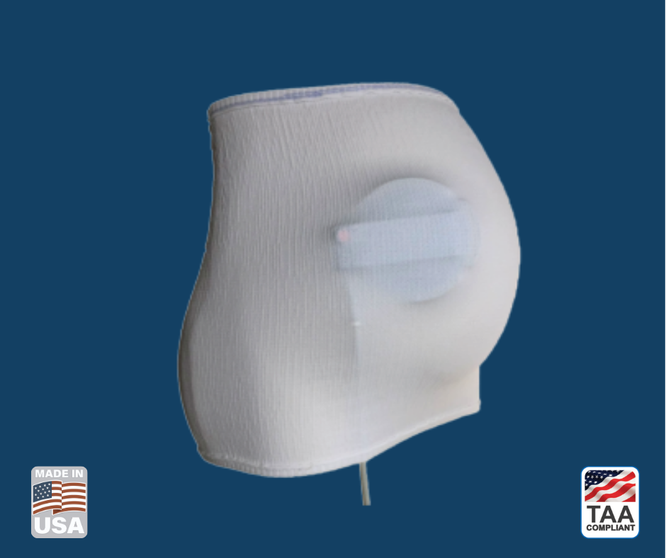 Elastic belly band for securing fetal monitoring sensors during pregnancy exams in center of picture with blue background. Made in the USA symbol in bottom left-hand corner. TAA Compliant symbol with American flag in bottom right-hand corner